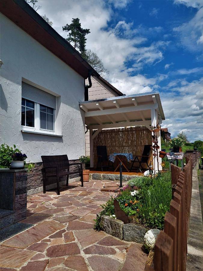 Ferienwohnung für 4 Personen, mit Terrasse und Garten sowie Ausblick