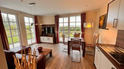 Ferienwohnung für 4 Personen, mit Terrasse und Sauna sowie Seeblick in Benz