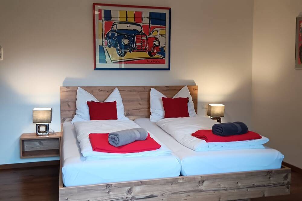 Gästehaus Huberfour-bed room with balcony in Mittersill, Kitzbüheler Alpen