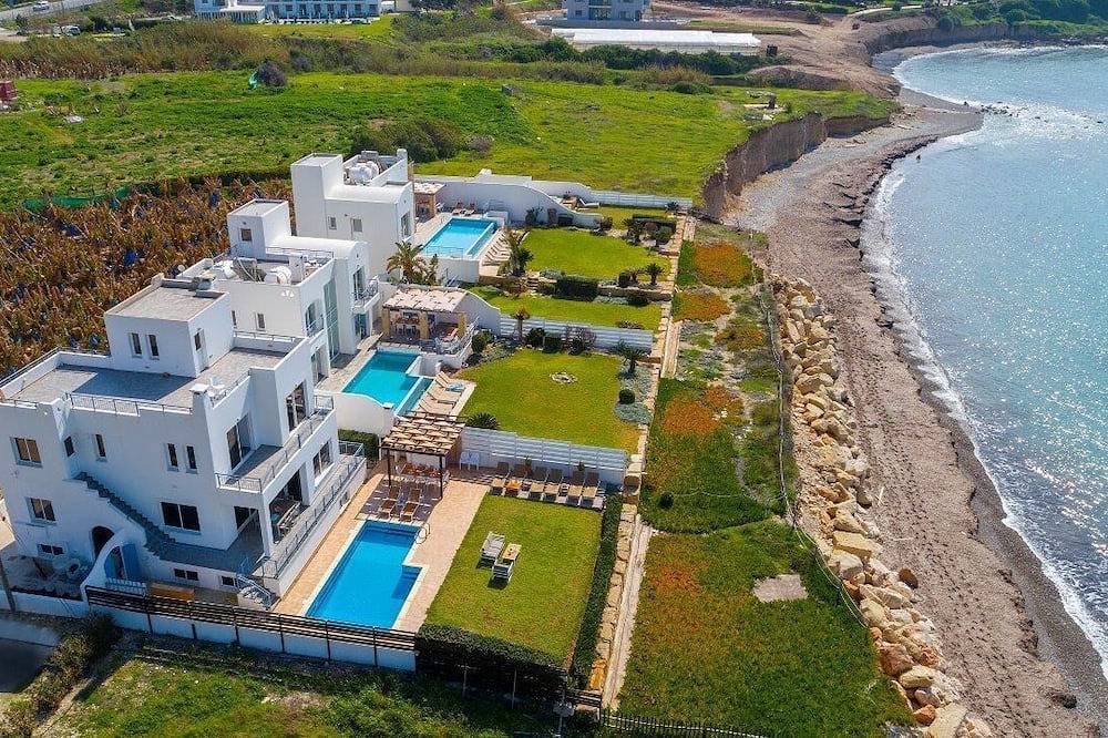 Poseidon beach villa, waterfront, private, tranquil, romantic sunsets in Peyia, South Cyprus