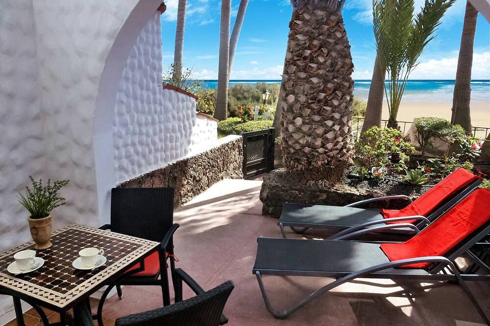 Luxus-Studio für Strand Liebhaber - Apartment direkt am Meer unter Palmen in Costa Calma, Pájara