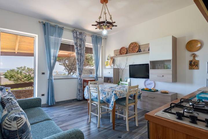 Holiday Home 'Mari' with Sea View, Private Terrace and Private Garden in La Pelosa, Stintino