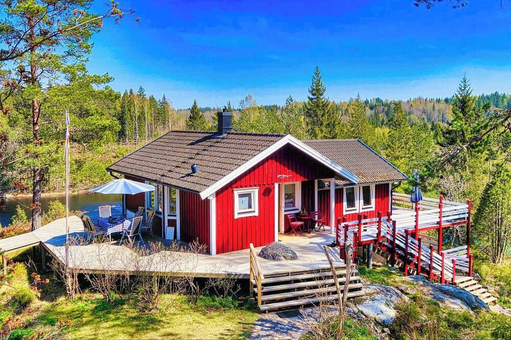 Ferienhaus Tived - direkt am See, Sauna, Boot, Badezuber in Tived distrikt, Laxa