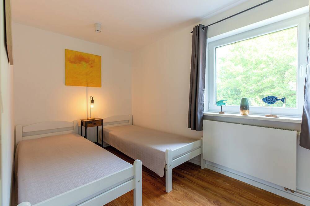 Ferienhaus Ckate Gemütliches Ferienhaus mit Kamin, Sauna & großem Garten in Brokdorf, Kreis Steinburg