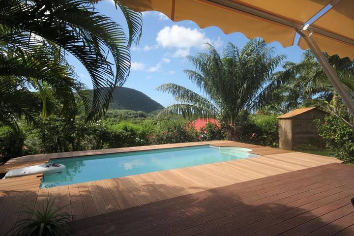 Location de vacances pour 4 personnes, avec jardin ainsi que vue et piscine dans Plage de Grande Anse