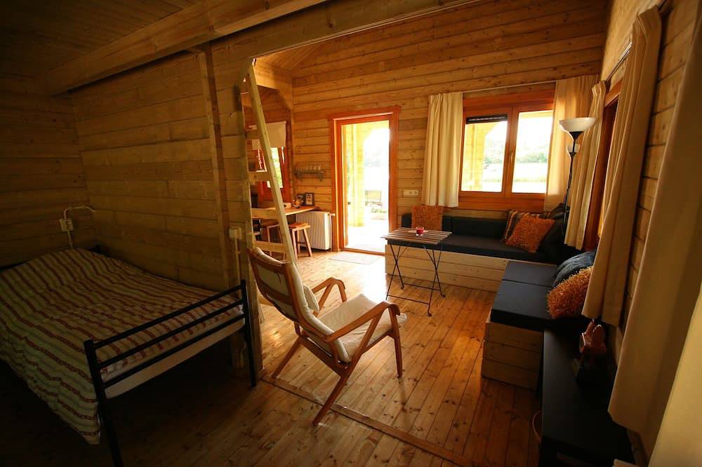 Chalet Copperwing on small-scale nature campsite 't Ol Gat. in Zoutkamp, Lauwersmeer