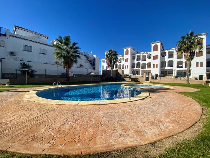 Location de vacances pour 4 personnes, avec piscine et balcon/terrasse dans Punta Prima (Alicante)