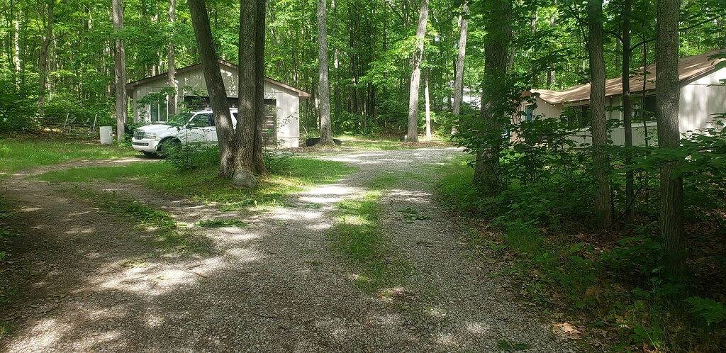 Sunrise Cove is a cozy cabin located within sight of Higgins lake & state land in Higgins Lake