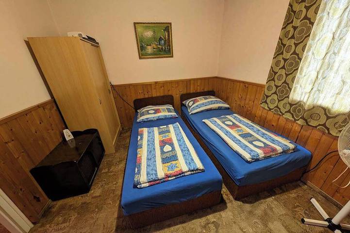 Ferienhaus 50 m zum Balaton mit eigenem Steg und Boot in Szantod, Plattensee Südufer
