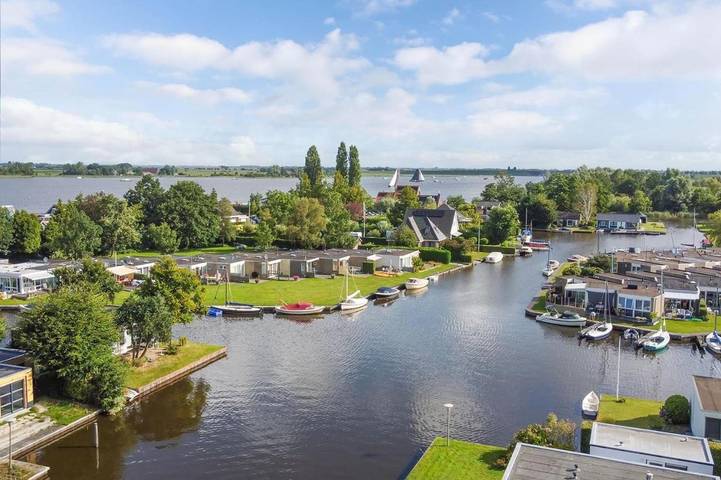 Ferienhaus für 5 Personen, mit Terrasse und Garten sowie Seeblick und Ausblick