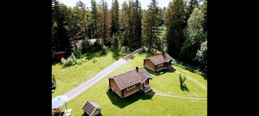 Ferienhaus für 4 Personen, mit Ausblick und Terrasse sowie Garten und Seeblick - 1