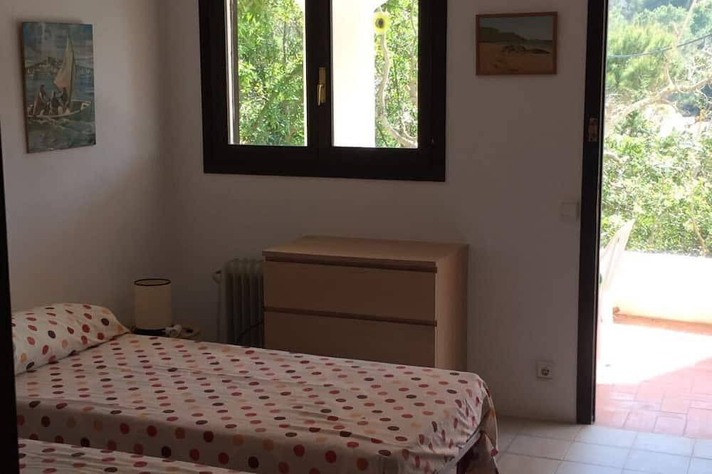 Encantadora casa con vista al mar-Cerca de la playa-Ideal para parejas o familia in Cala Vedella, Sant Josep de sa Talaia