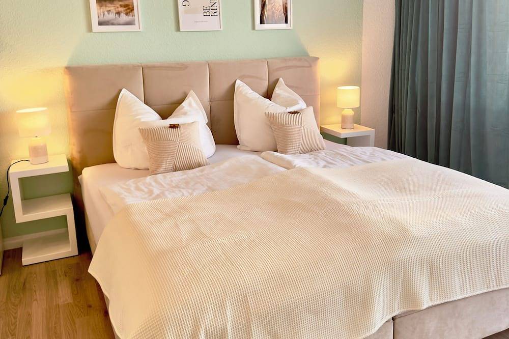 Ganze Wohnung, M&D Apartments nähe Stadion mit Balkon - Netflix - Küche - Sunset View in Kaiserslautern, Saar-Nahe-Bergland