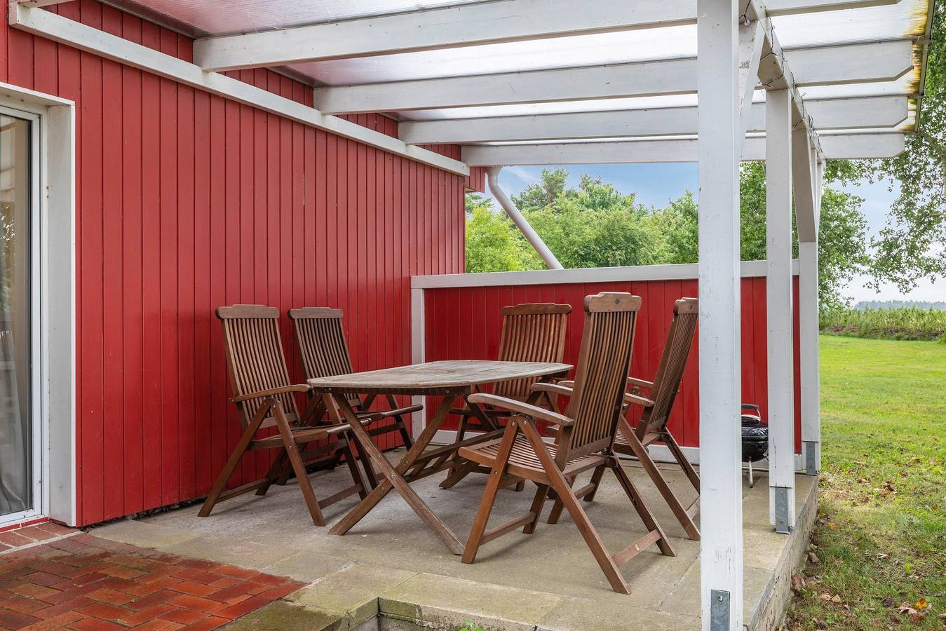 Ferienhaus 'Rotes Haus' mit privater Terrasse, Garten und Wlan in Suhrendorf, Ummanz