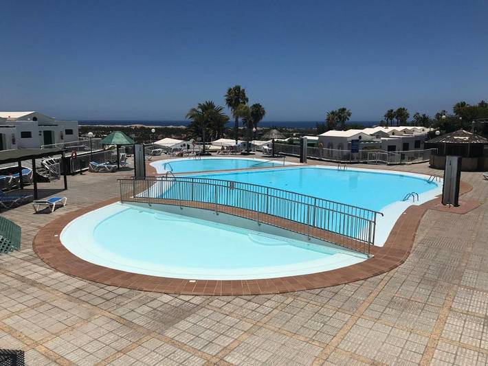 Bungalow para 6 personas, con jardín además de vistas y piscina, Se admiten mascotas en Sonnenland