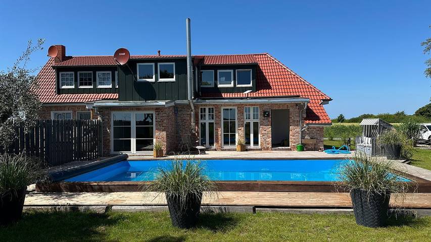 Ferienhaus für 4 Personen, mit Garten und Pool in Ostermarsch