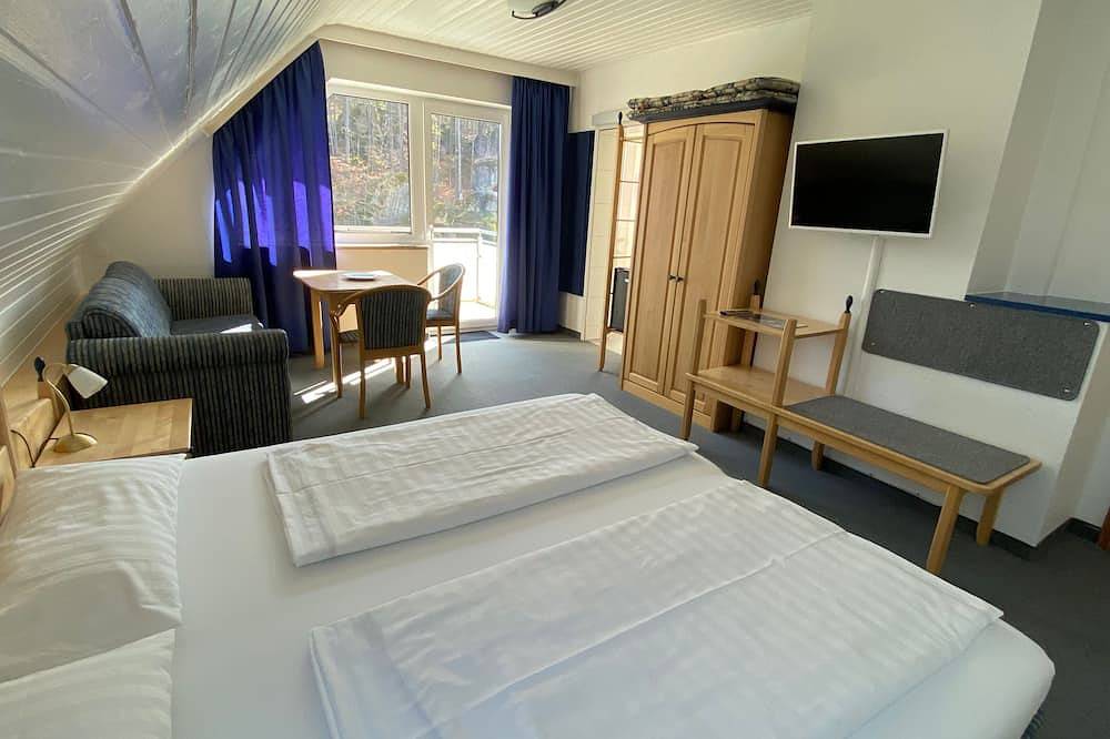 Familienzimmer mit Balkon - Gästehaus Brütting in Obertrubach, Frankenalb