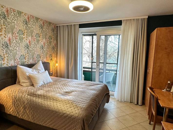 Ferienwohnung für 2 Personen, mit Balkon und Ausblick sowie Seeblick