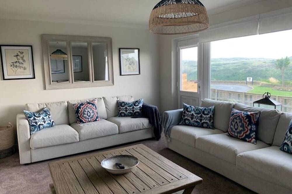 Coastal family home a stones throw from the beach. in Holywell Bay, Cornwall