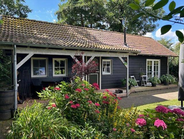 Ferienhaus für 4 Personen, mit Terrasse und Garten sowie Ausblick