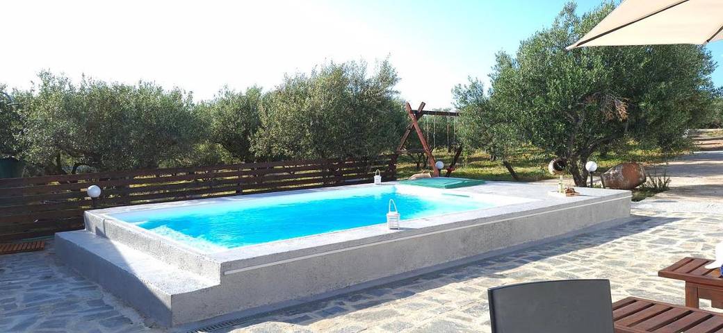 Location de vacances pour 5 personnes, avec vue ainsi que piscine et jardin, adapté aux familles dans Milatos Beach - 4