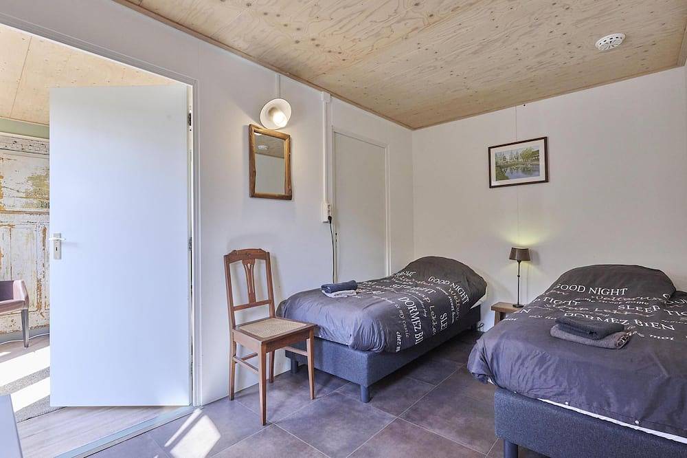 Groepsboerderij met grote tuin in bosrijk gebied in Noord-Brabant