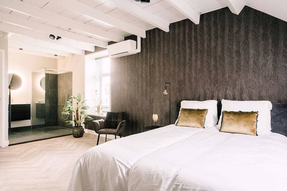 Geheel appartement, Stadsvilla kamer met hotelbed en gedeelde keuken in Tilburg, Noord-Brabant