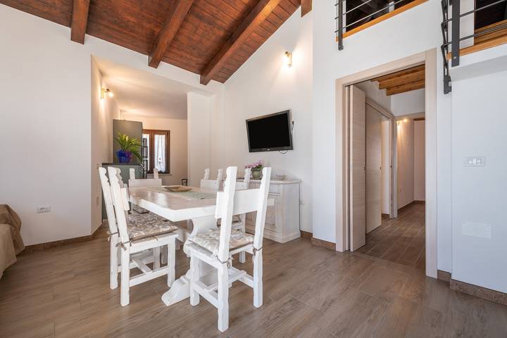 Casa vacanze "Casa Giovanna" con terrazza privata, giardino e aria condizionata in Is Loccis, San Giovanni Suergiu