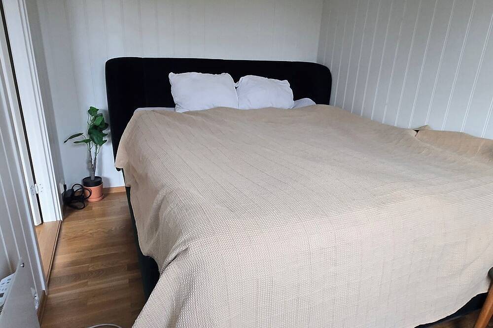 Ganze Wohnung, Spacious Scandinavian-style apartment right by the forest with beautiful views in Kristiansand