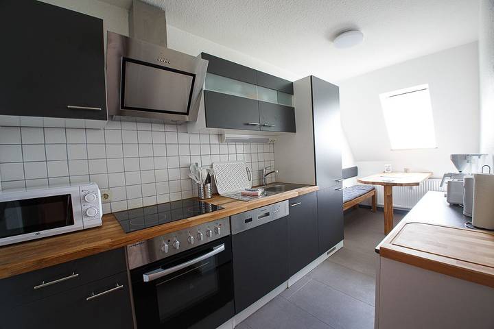 Ferienwohnung für 4 Personen, mit Terrasse und Garten sowie Ausblick in Midlum - 3