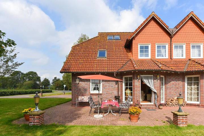 Ferienwohnung für 4 Personen, mit Terrasse und Garten sowie Ausblick in Dunum - 3