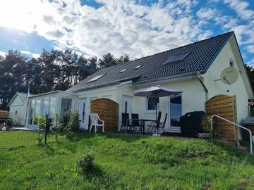 Ferienhaus für 5 Personen, mit Terrasse und Seeblick in Lütow