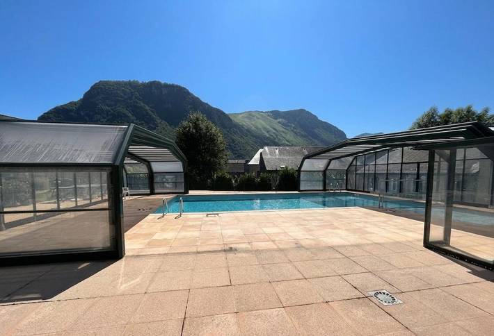 Appartement de vacances pour 4 personnes, avec Terrasse et Jardin ainsi que Piscine et Vue