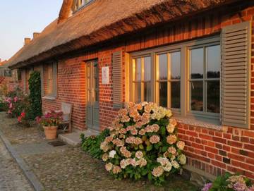 Ferienwohnung für 6 Personen, mit Seeblick und Garten sowie Ausblick in Lancken-Granitz
