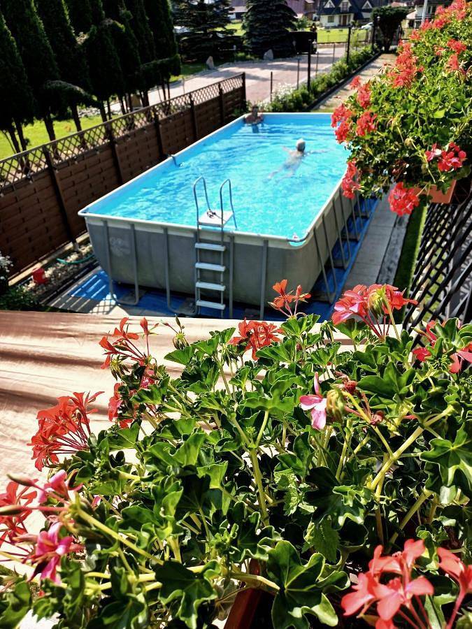 Gîte pour 2 personnes, avec jardin ainsi que vue et piscine à Poronin