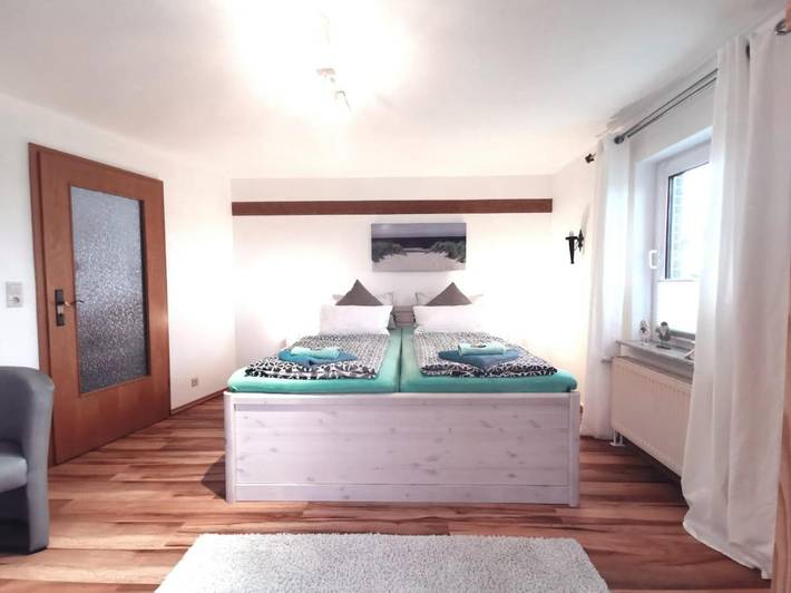 Ferienwohnung für 2 Personen, mit Terrasse und Garten sowie Ausblick in Altharlingersiel