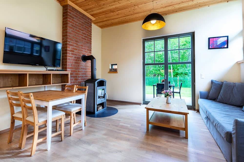 Ganze Wohnung, Ferienwohnung Sonne mit Terrasse, Kamin und Garten - Ferienhaus Sonne, Mond und in Steffenshagen, Bad Doberan & Umland