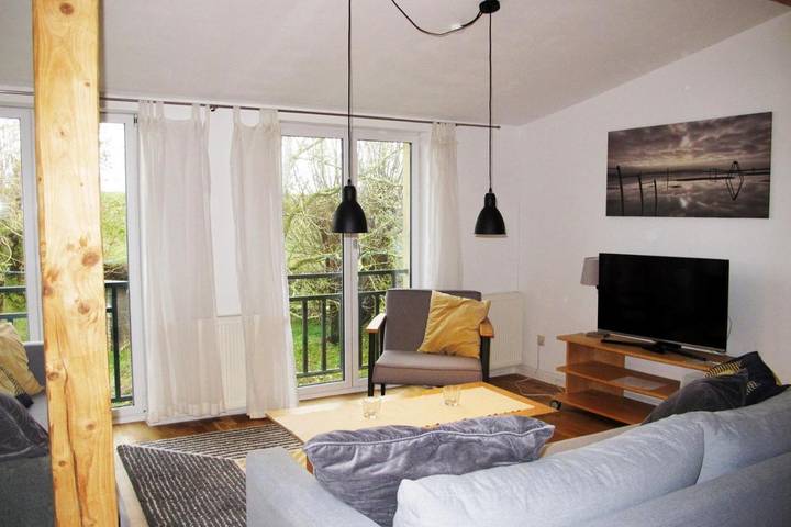 Ferienhaus für 8 Personen, mit Balkon und Garten