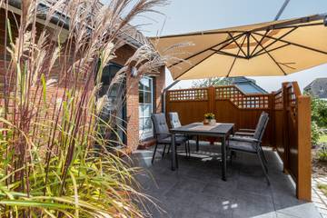 Ferienhaus 'Friesenkate Frieko' mit privater Terrasse, privatem Garten und WLAN