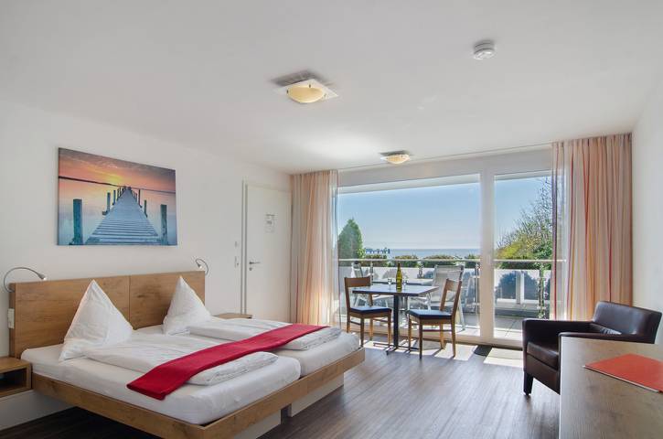 Ferienwohnung für 2 Personen, mit Balkon und Garten sowie Seeblick