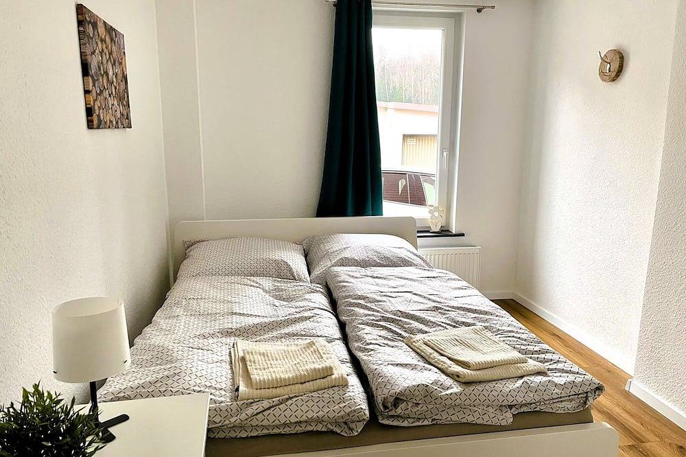 Ganze Wohnung, Große, moderne Ferienwohnung mit Garten und Spielscheune - Hexe 1 in Tanne, Harzvorland