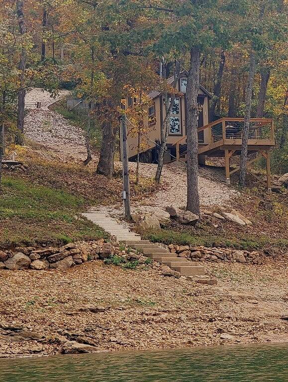 Tiny Cabin-Lakefront Perfect Escape for 1 or 2 Guests; King Size Bed in Loft. in Beaver Lake