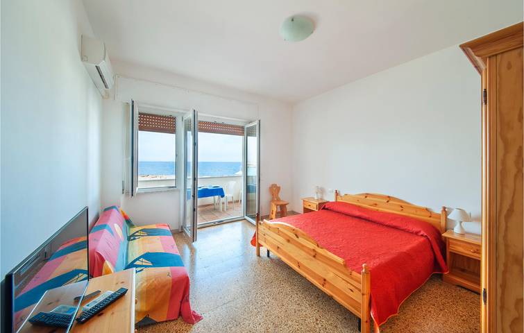 Appartement de vacances entier, Terrasse en bord de mer avec WiFi et climatisation - 300m de Scogliolungo in Scogliolungo, Porto Torres