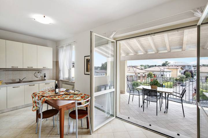 Vakantieappartement voor 5 personen, with Balkon and Tuin as well as Uitzicht op het meer