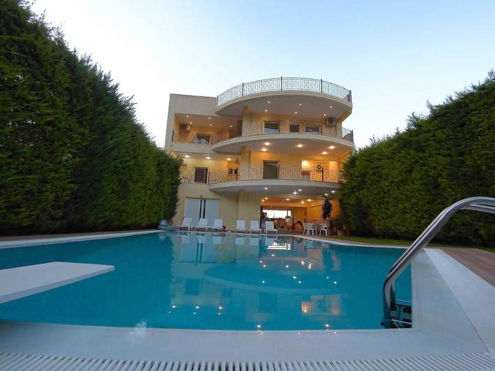 Appartement de vacances pour 4 personnes, avec Balcon et Terrasse ainsi que Jardin et Piscine