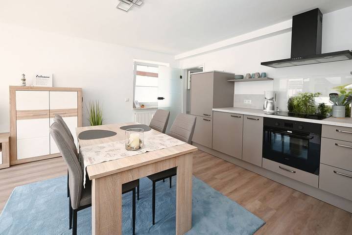 Ganze Wohnung, Ferienwohnung Strandlöper – Ihr Urlaub in erster Reihe mit eigener Wallbox und Meerzeit Eintritt in Büsum, Kreis Dithmarschen