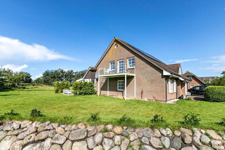Ganze Wohnung, "Ferienwohnung Ebbe" mit privater Terrasse, Gemeinschaftsgarten und Wi-Fi in Rodenäs, Nordfriesland