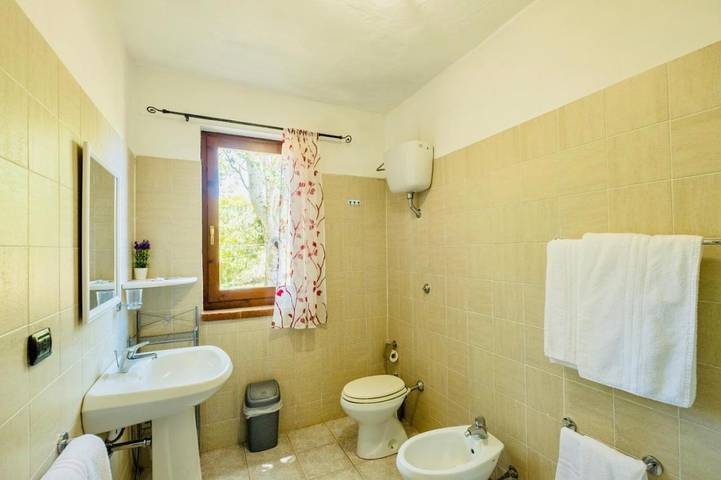 Location de vacances pour 2 personnes, avec Terrasse et Jardin ainsi que Piscine et Vue à Carbonia - 2