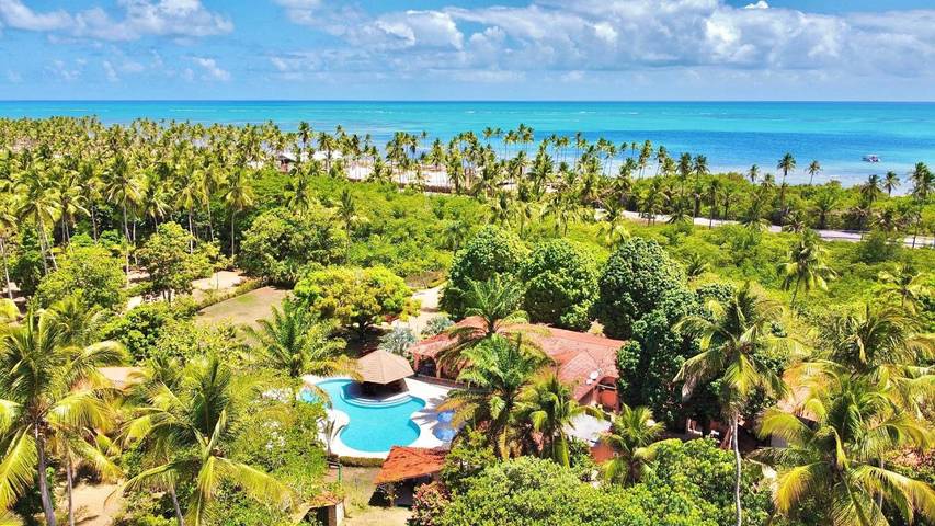 Pousadas para 5 pessoas, com piscina infantil e piscina e ainda vista and jardim em Japaratinga