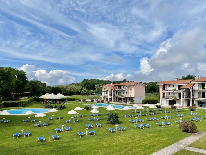 Ferienwohnung für 4 Personen, mit Balkon und Garten sowie Pool in Costermano